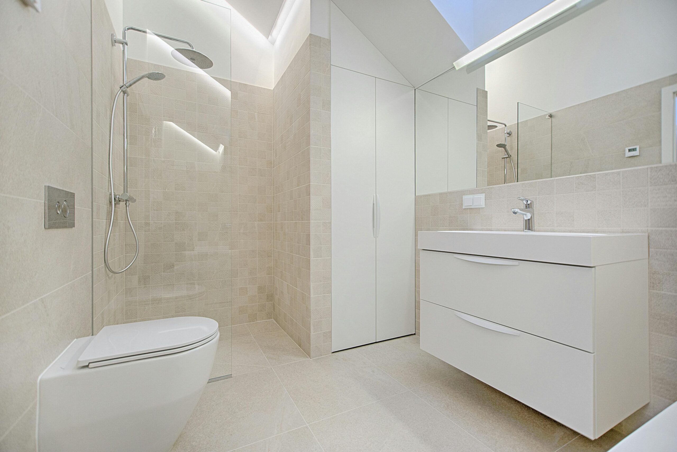 Services Bright and luxurious bathroom with contemporary fixtures and sleek design.